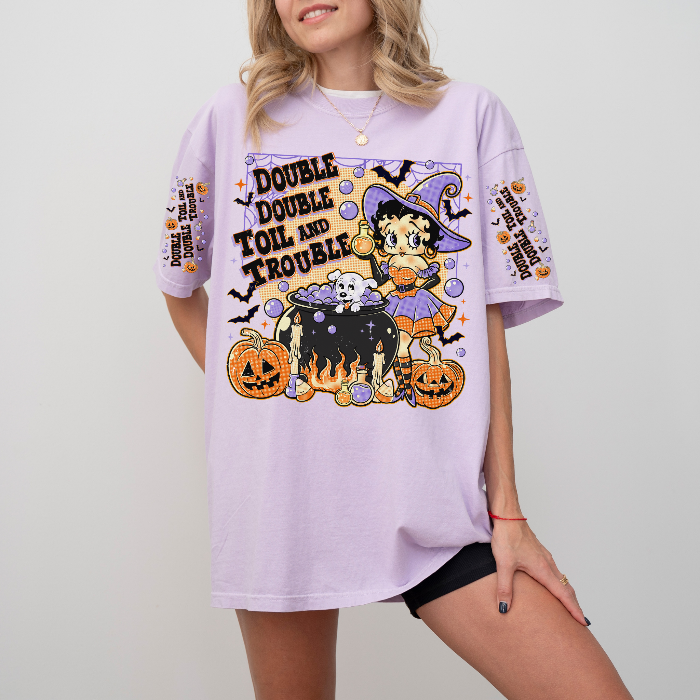 Two people wearing t-shirts with a Halloween-themed design featuring Betty Boop. vintage-witch-halloween-tee