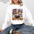 Person wearing a white sweatshirt with a Halloween-themed design featuring Betty Boop.  vintage-witch-halloween-tee