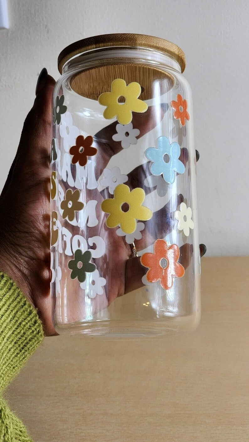 mama glass can tumbler filled with iced coffee