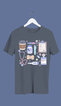 A navy blue sweatshirt with hand-drawn medical doodles including a stethoscope, syringe, band-aids, and a steaming cup of coffee.